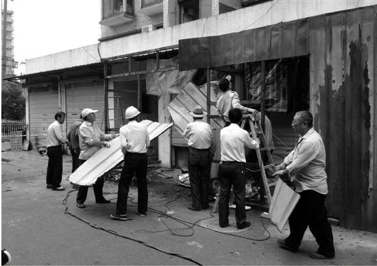 下沙街道拆除松合小区38处违建 下沙街道拆除松合小区38处违建